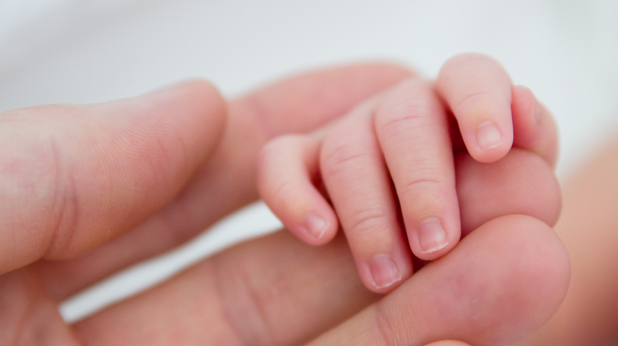 Touch of newborn