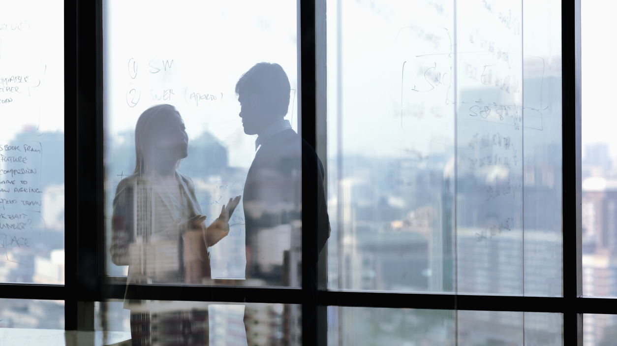 Silhouette shadows of business people talking in office