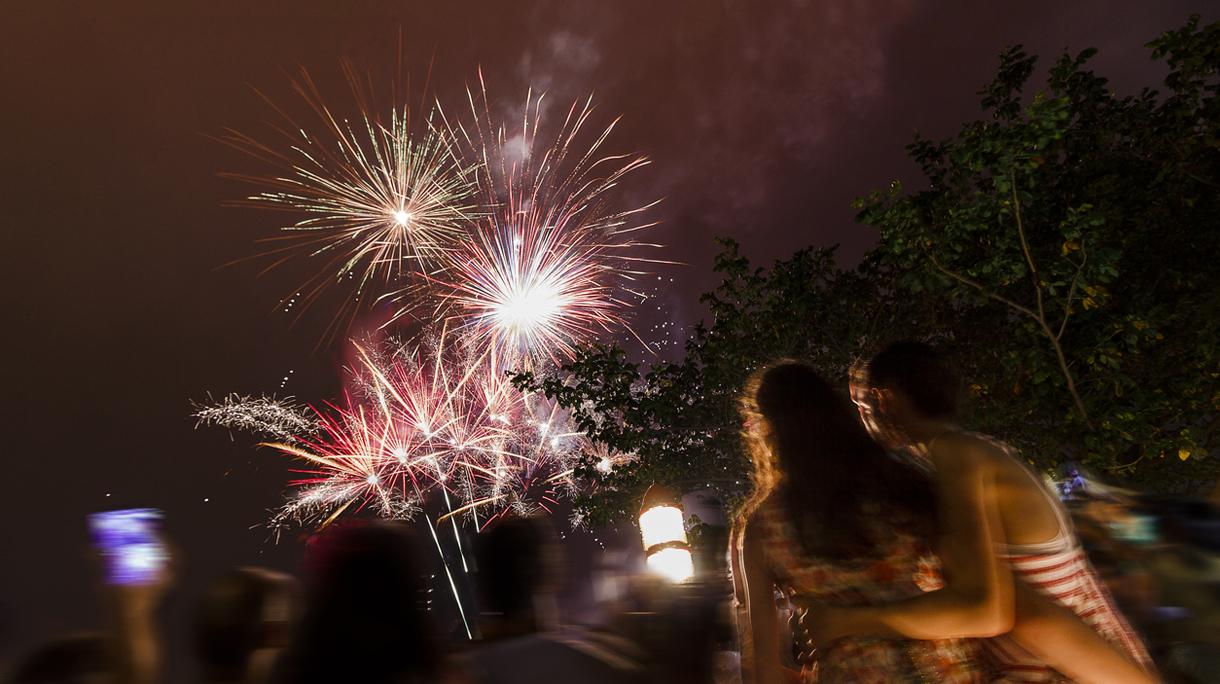 Young Sisters Watching Fireworks on New Year´s Day