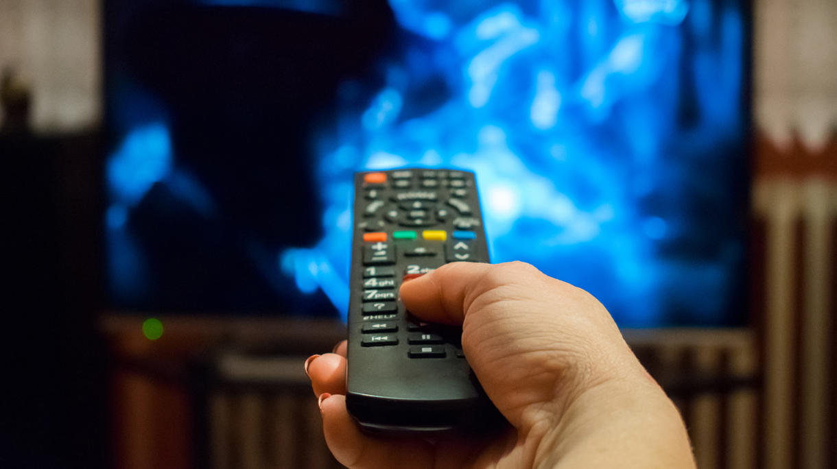 Watching tv and using remote control
