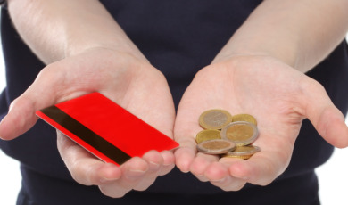 Man holding a money and credit card