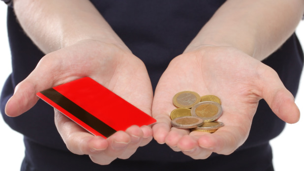 Man holding a money and credit card