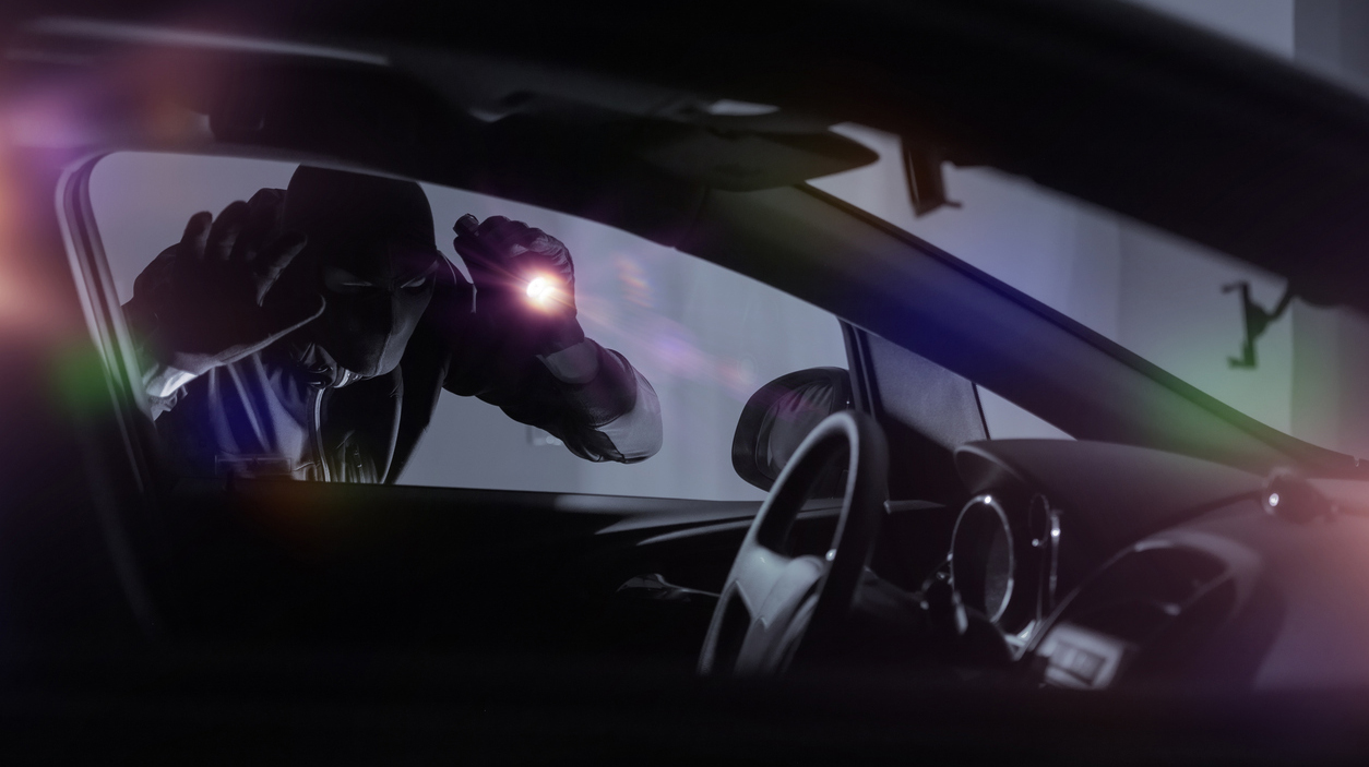 Car Robber with Flashlight