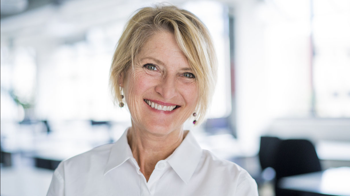 Portrait of happy businesswoman in office