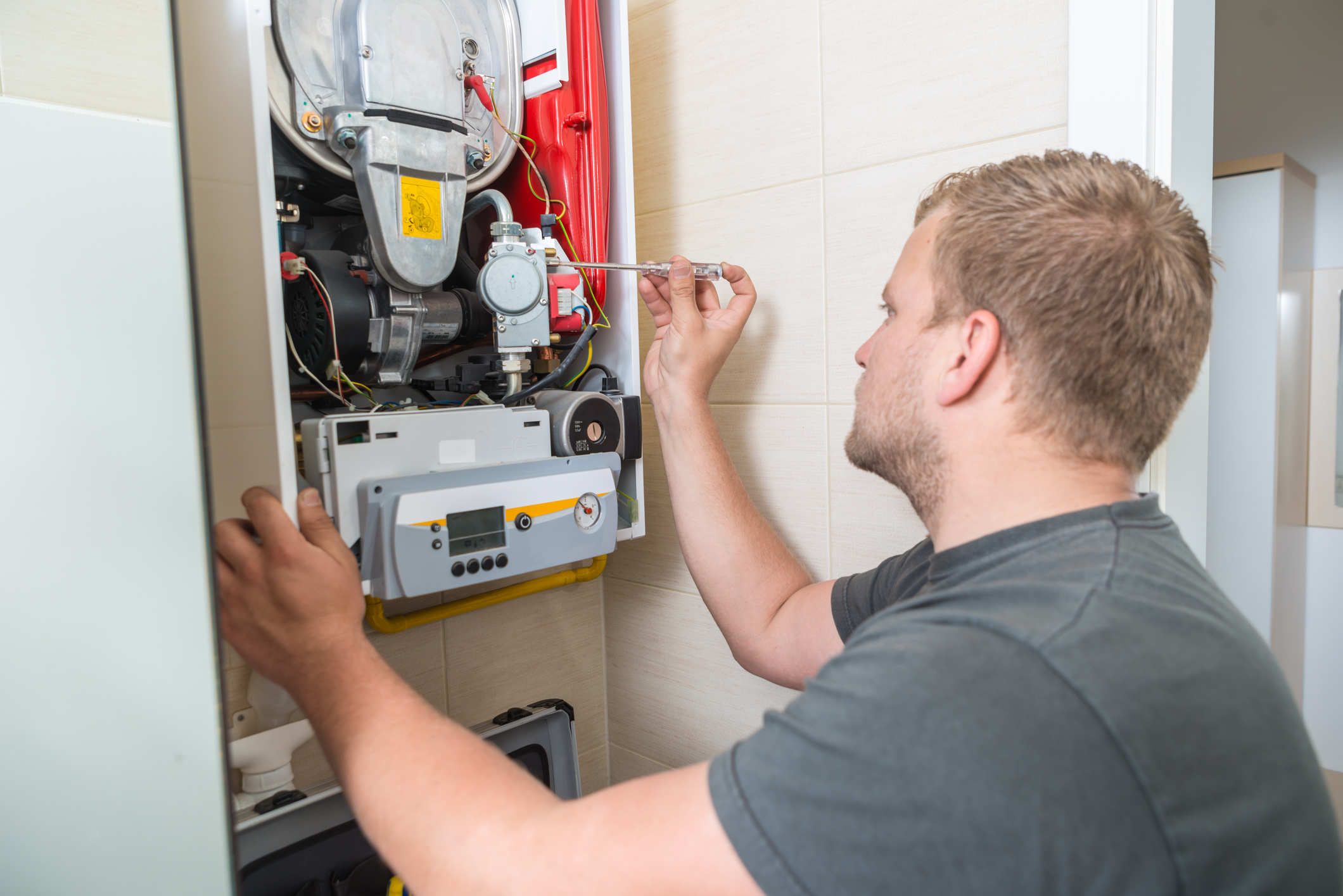 Technician repairing Gas Furnace