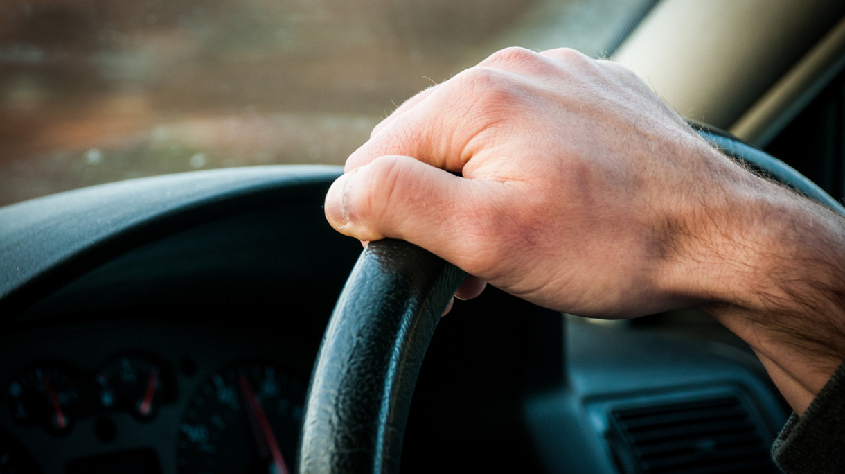 Hand on streering wheel