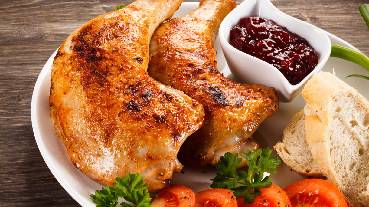 Roasted chicken legs and vegetables