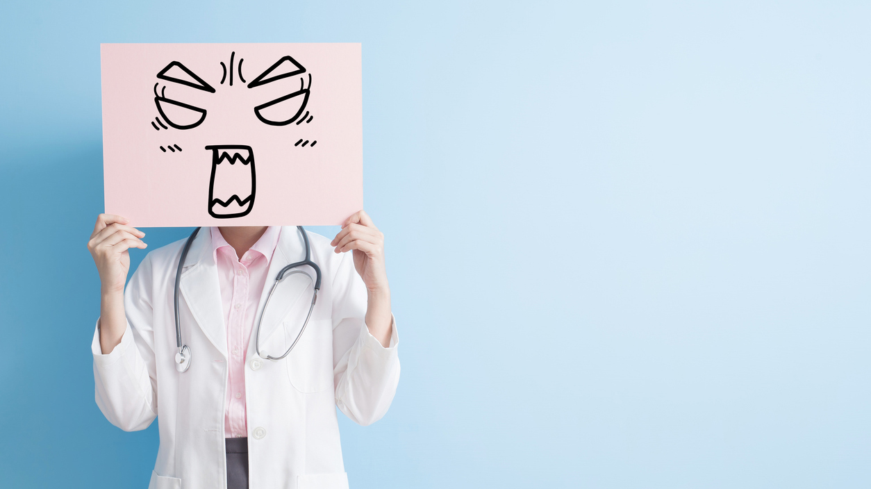 woman doctor show angry billboard