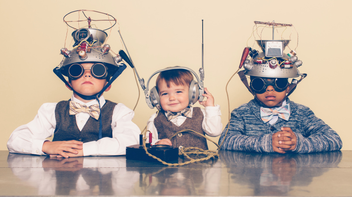 three-boys-dressed-as-nerds-with-mind-reading-helmets-picture-id623504166