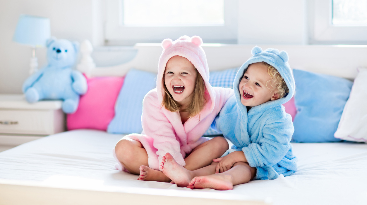 Children in bathrobe or towel after bath