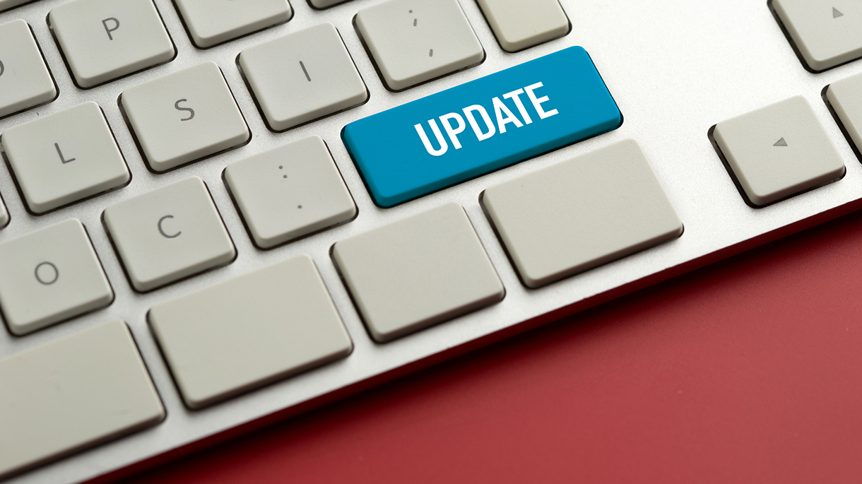 Computer key showing the word UPDATE