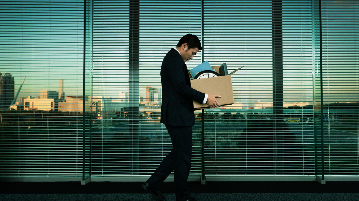 asian-office-worker-leaving-his-job-in-layoff-for-recession-picture-id117148288
