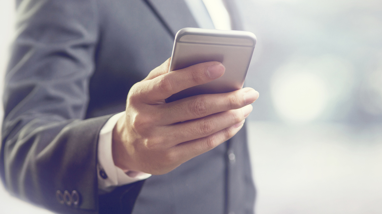 business man using mobile smart phone