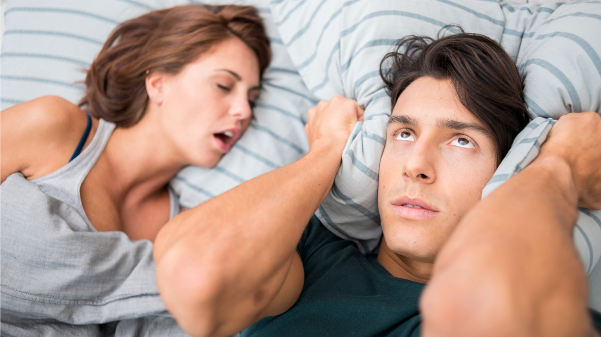 man-cannot-sleep-because-his-wife-snores-picture-id481674318