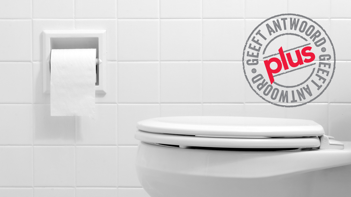 Clean, white bathroom toilet with the lid closed