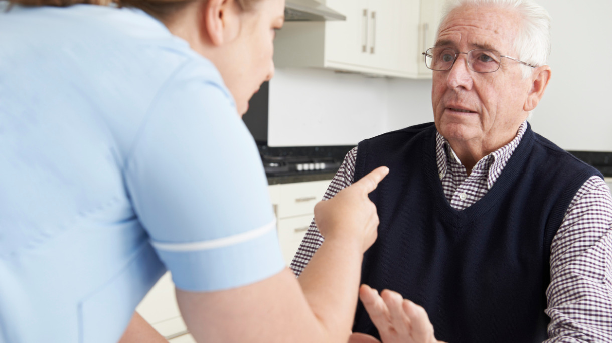 care-worker-mistreating-elderly-man-picture-id530424933