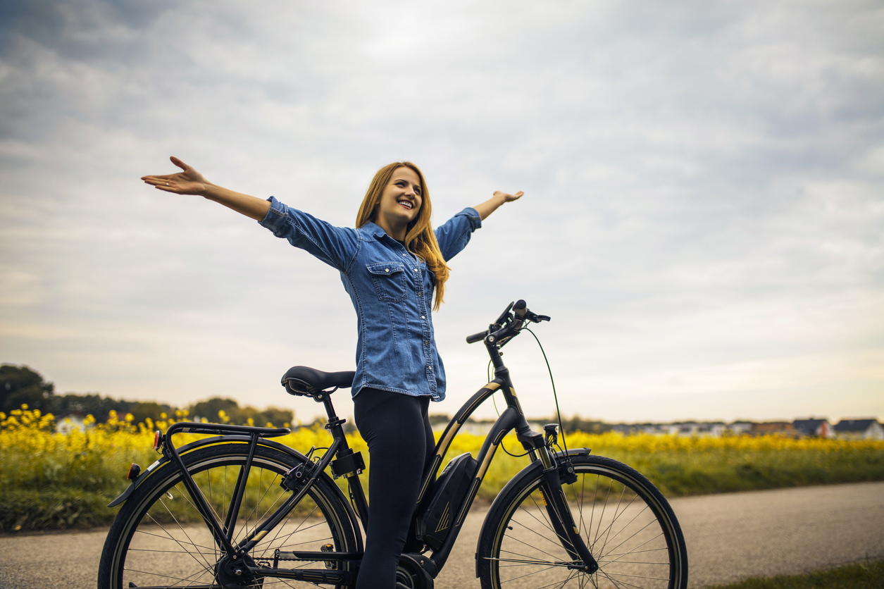 Woman riding on her Electric Bike