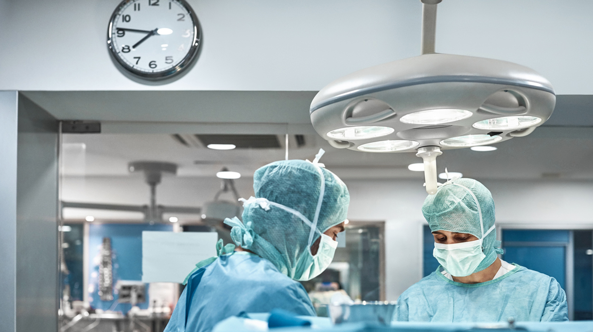 Vet surgeons performing surgery in hospital