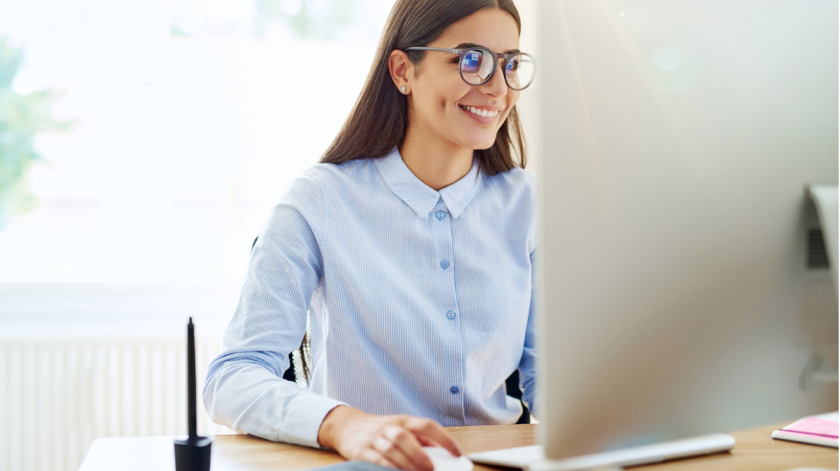 smiling-digital-artist-working-on-computer-picture-id6823847621