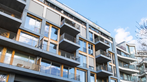 modern apartments with balconys and blue sky