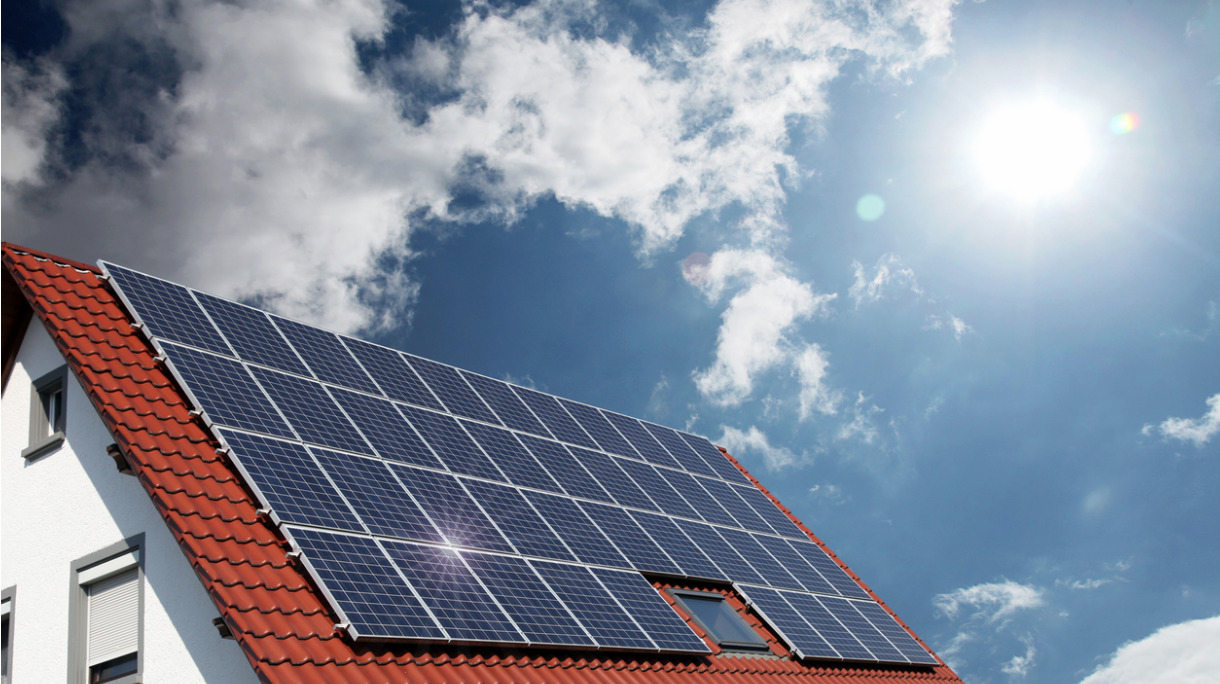 solar-panels-on-house-roof-picture-id503636786