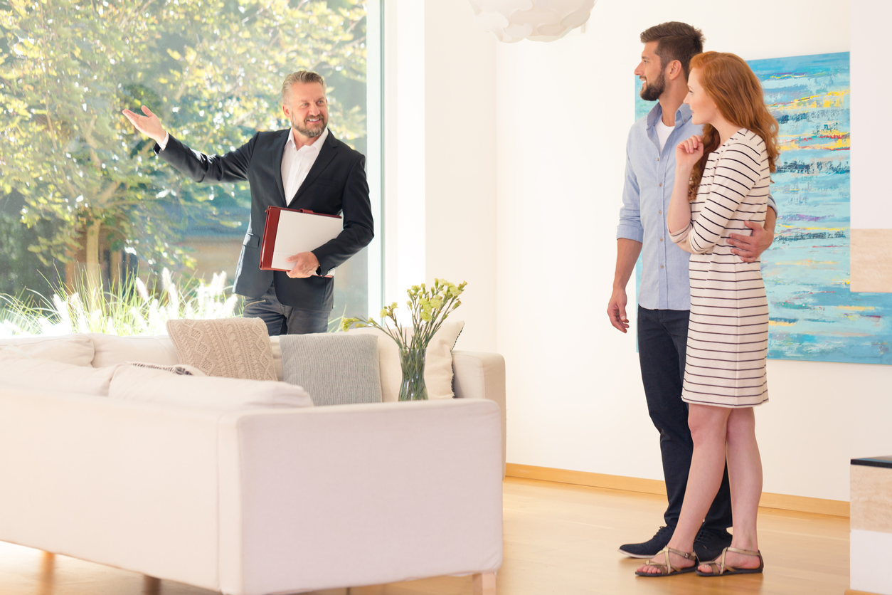 Agent showing home interior