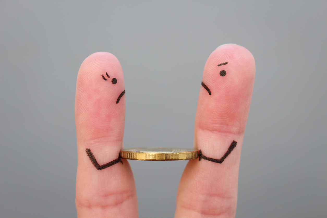 Fingers art of family during quarrel. Concept of man and woman cannot divide money after divorce.