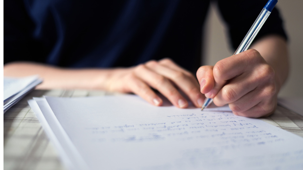 hand-writing-text-on-paper-background-with-copy-space-picture-id863698106