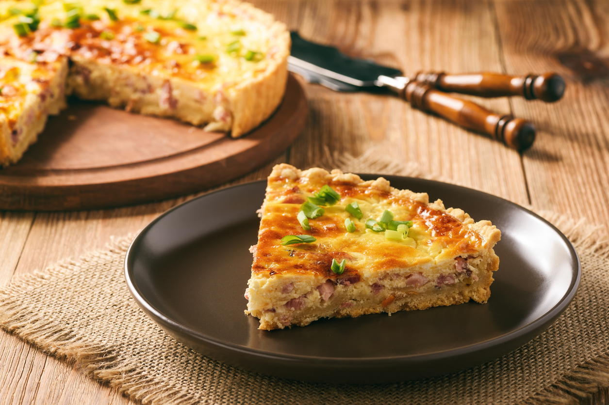 Traditional french pie with bacon and cheese – quiche lorraine.