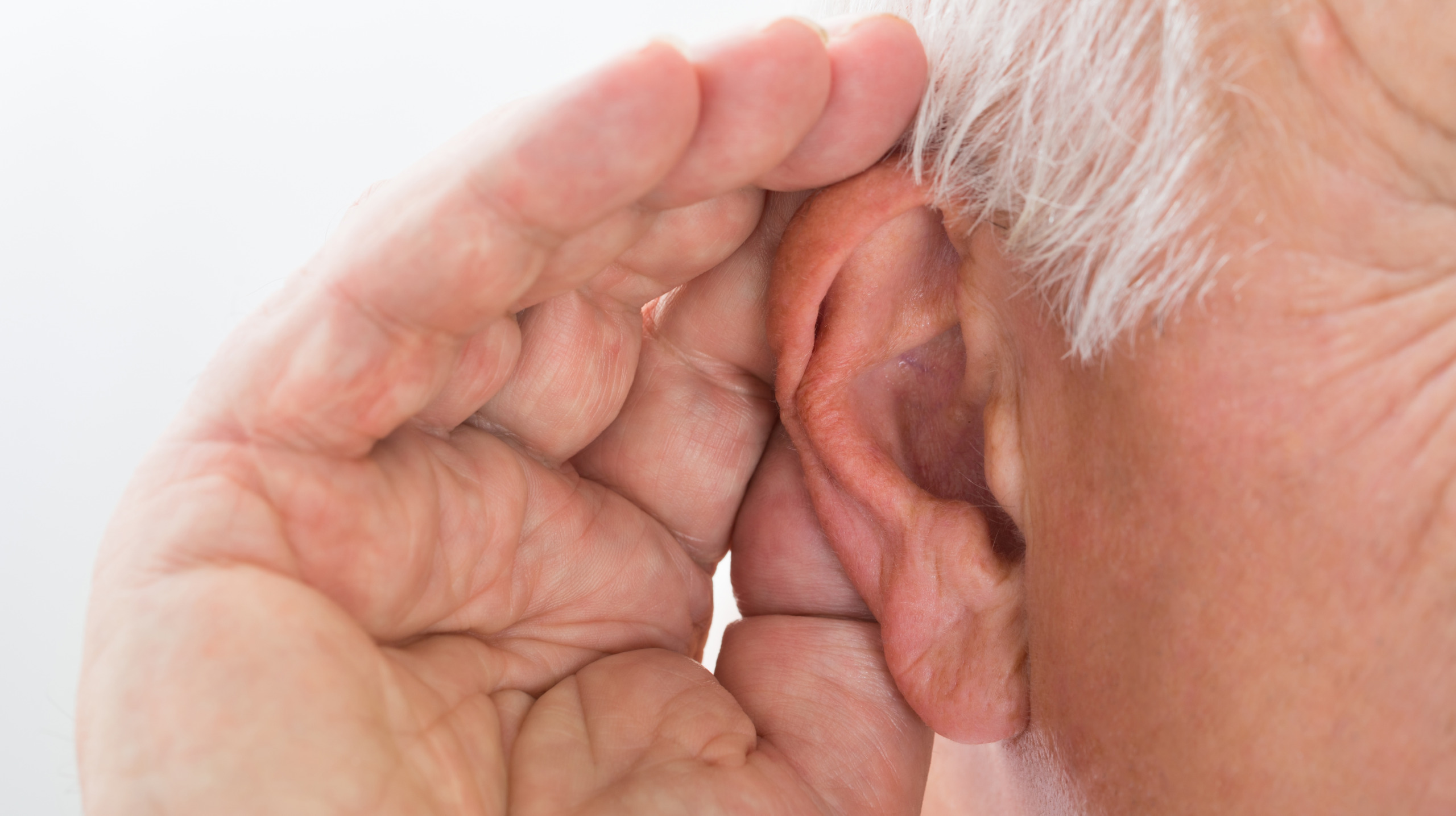 Close-up Of A Man Trying To Hear