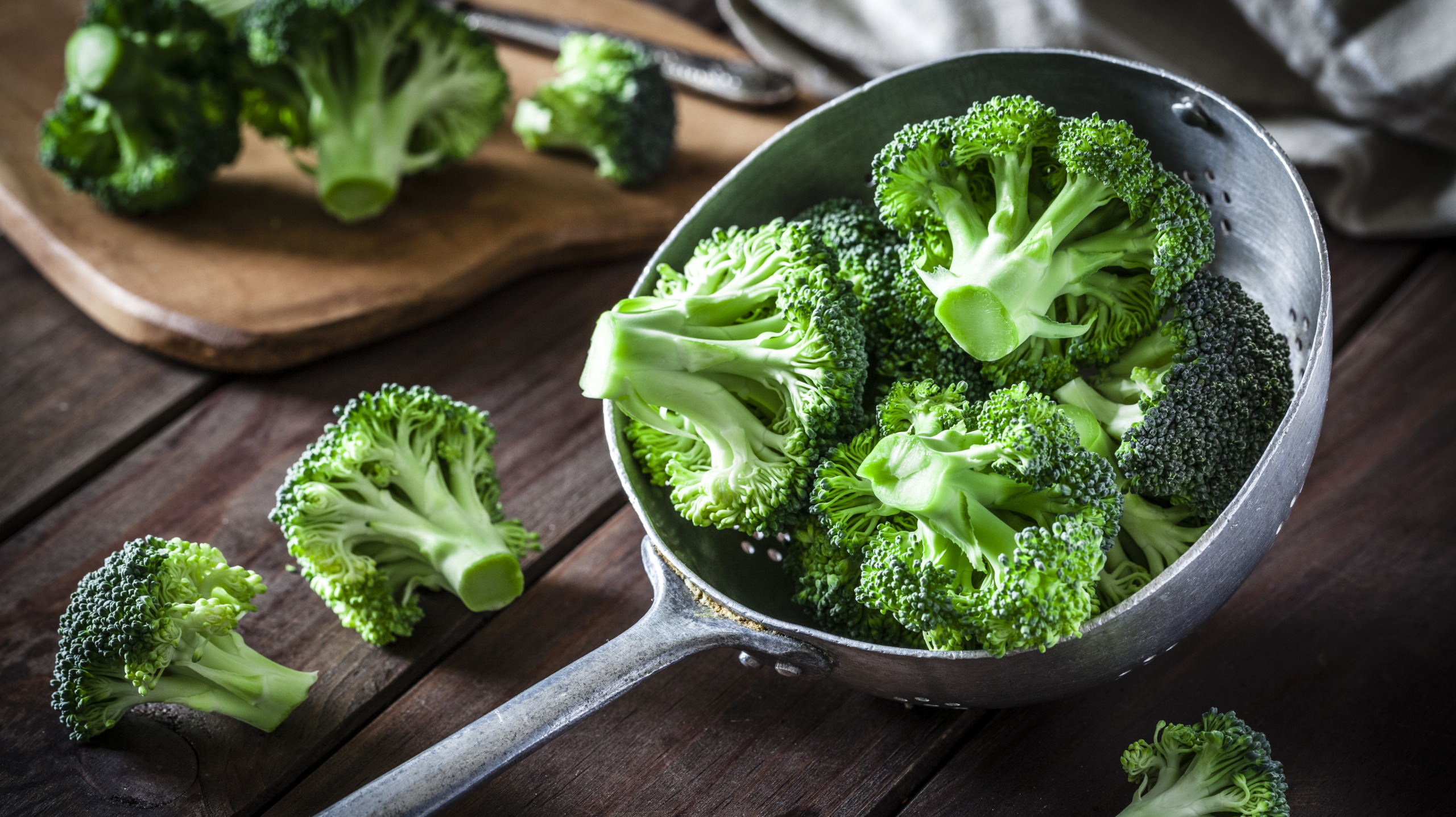 Broccoli in an old metal colander