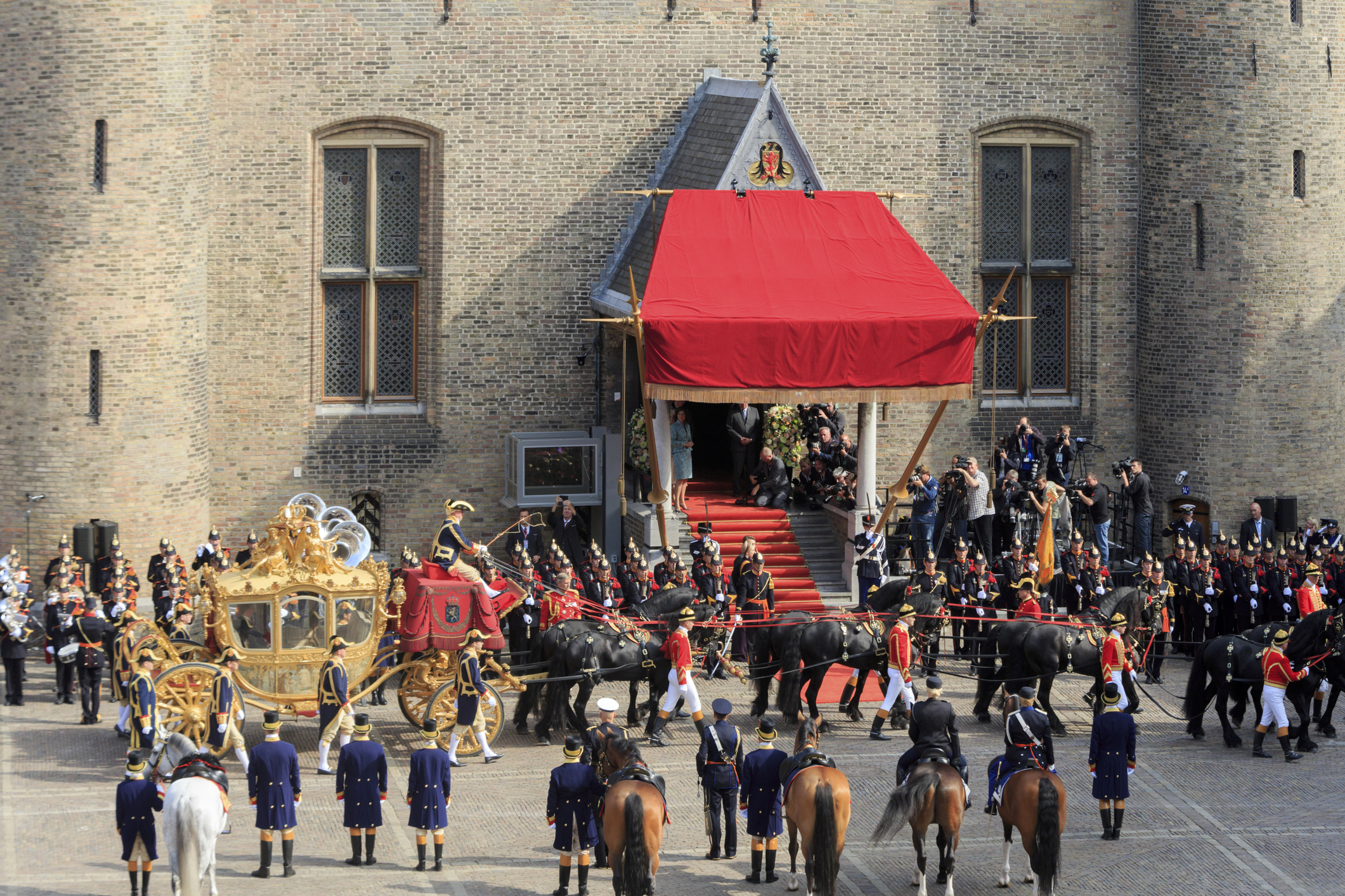 Golden Coach arriving on Binnenhof during Prinsjesdag in The Hague