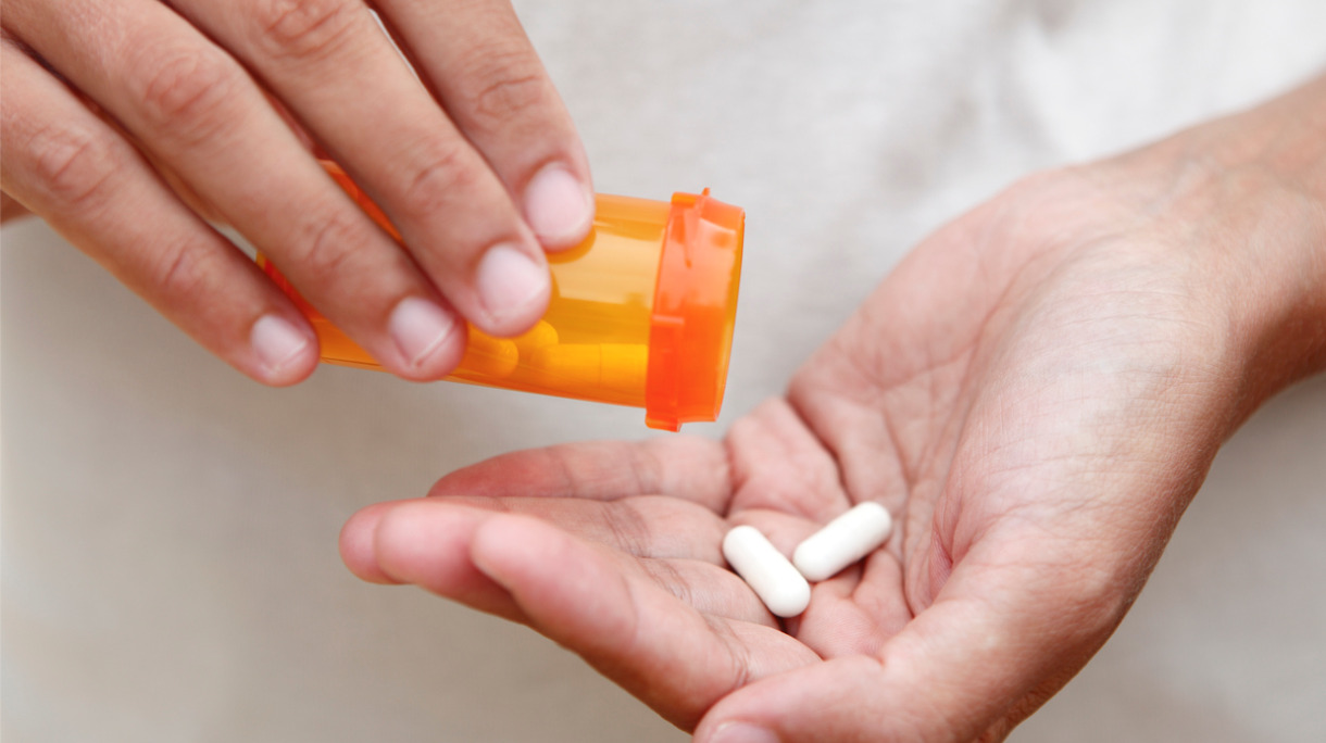 medicines-in-hand-picture-id183430520