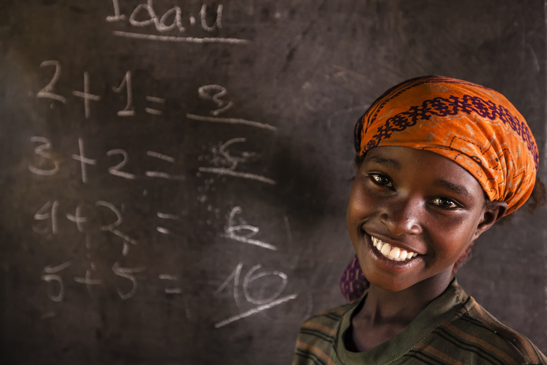 African little girl during math class, southern Ethiopia, East Africa