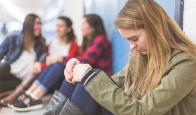 Alone in high school hallway