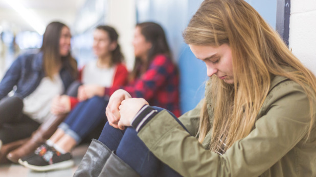 Alone in high school hallway