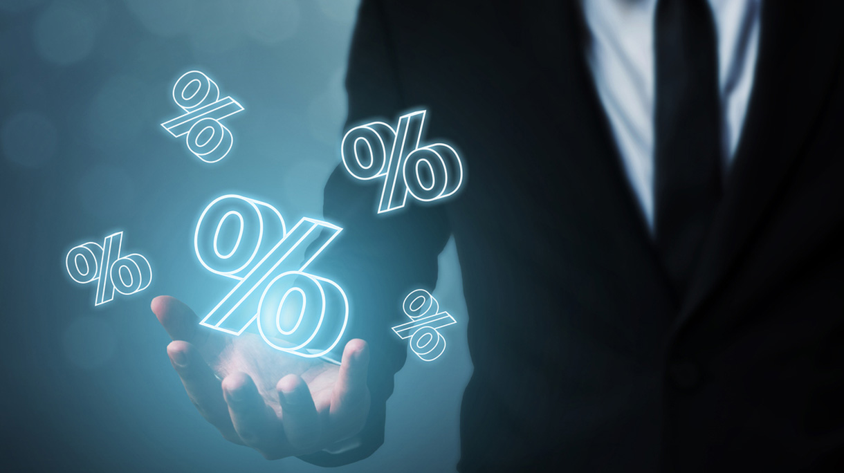 Interest rate financial and mortgage rates concept. Businessman hand show icon percent 3d sign