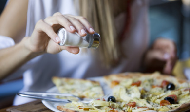 Salting pizza