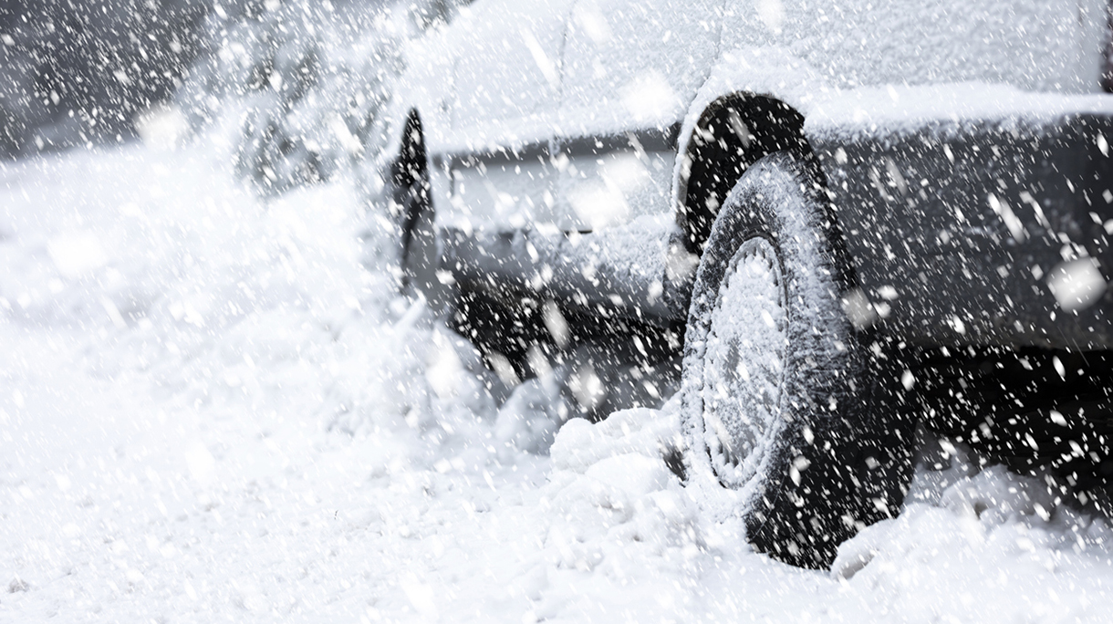 Car tires on winter road