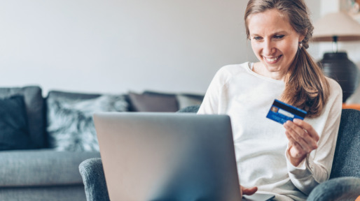Smiling woman shopping on-line