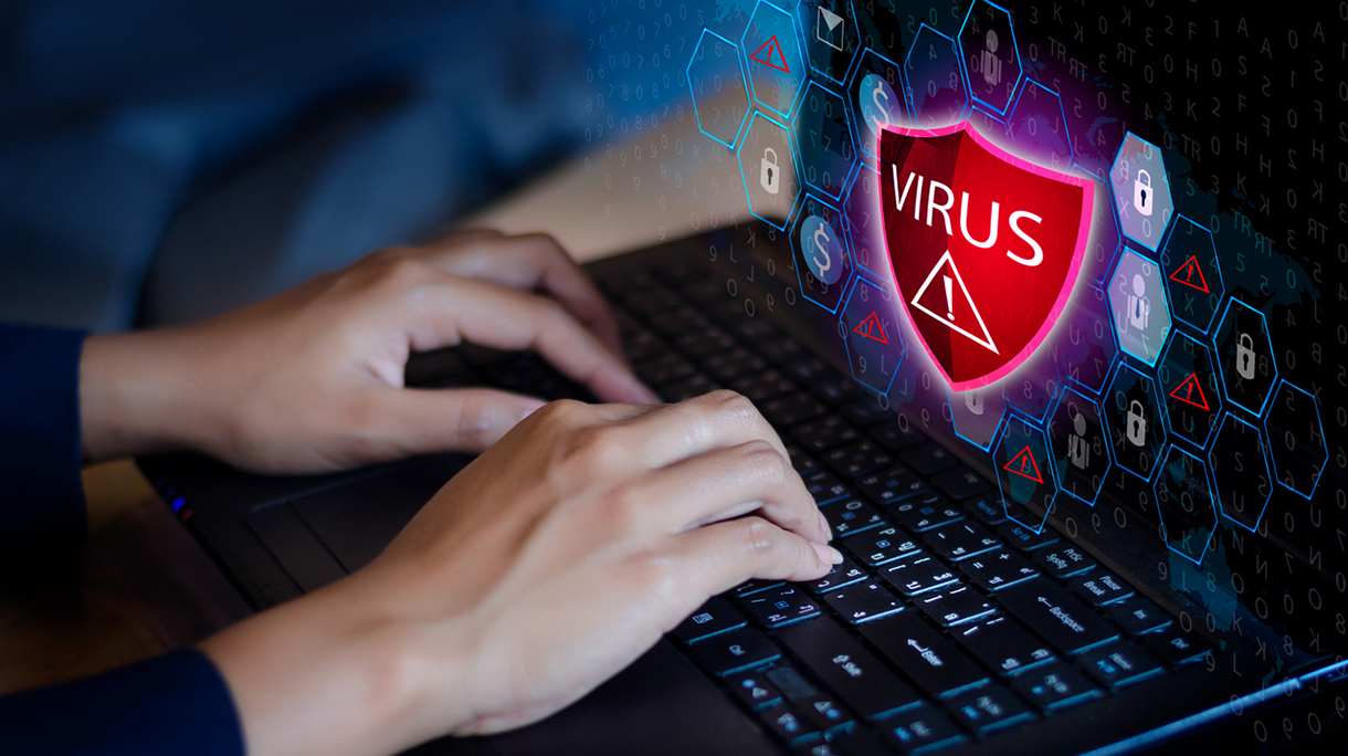 Press enter button on the keyboard computer Protective shield virus red Exclamation Warning Caution Computer in dark with word virus