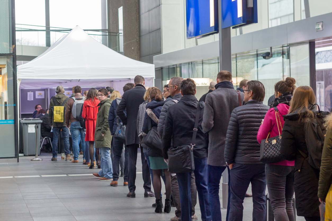 voters lining up to vote at train station