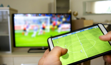 Playing soccer on a TV with a smartphone
