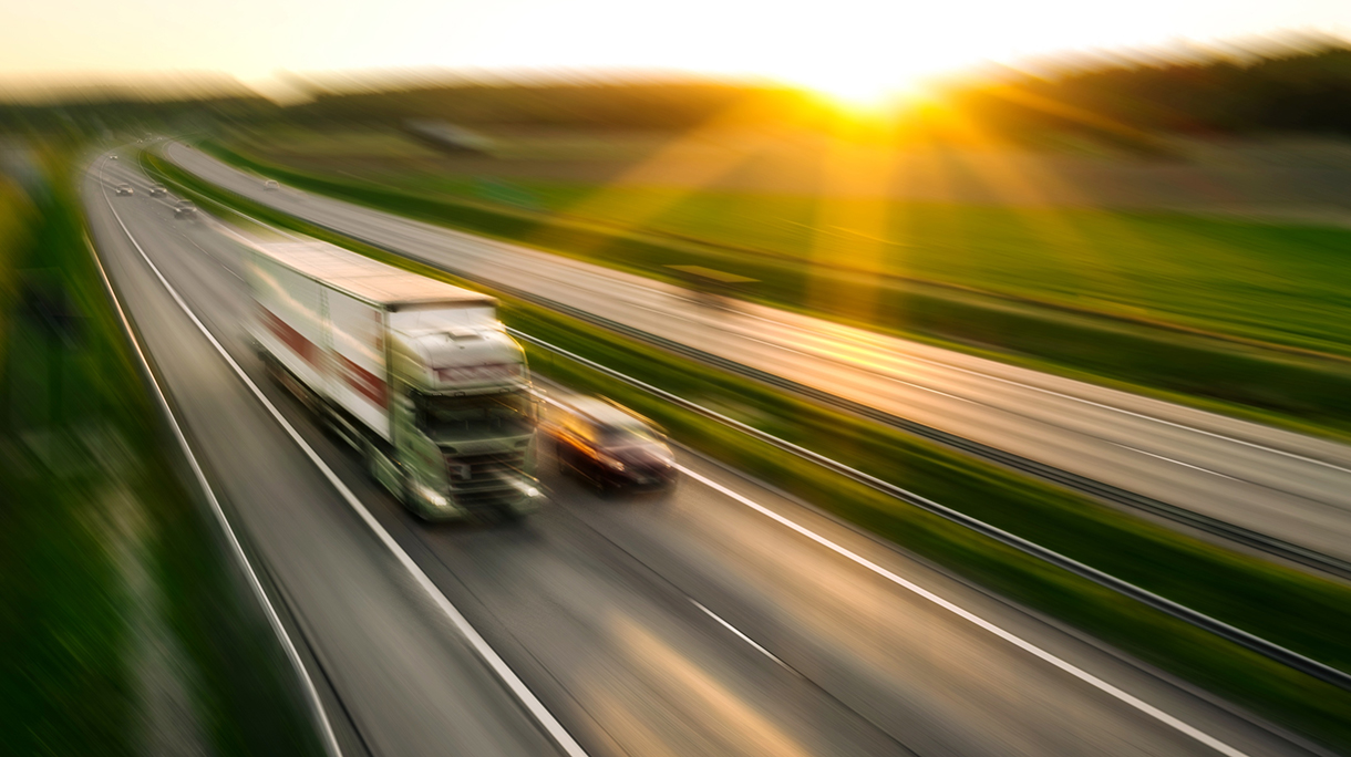 Blurred Motion Of Vehicles On Road During Sunset