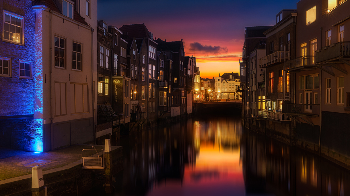 Canal In City At Night