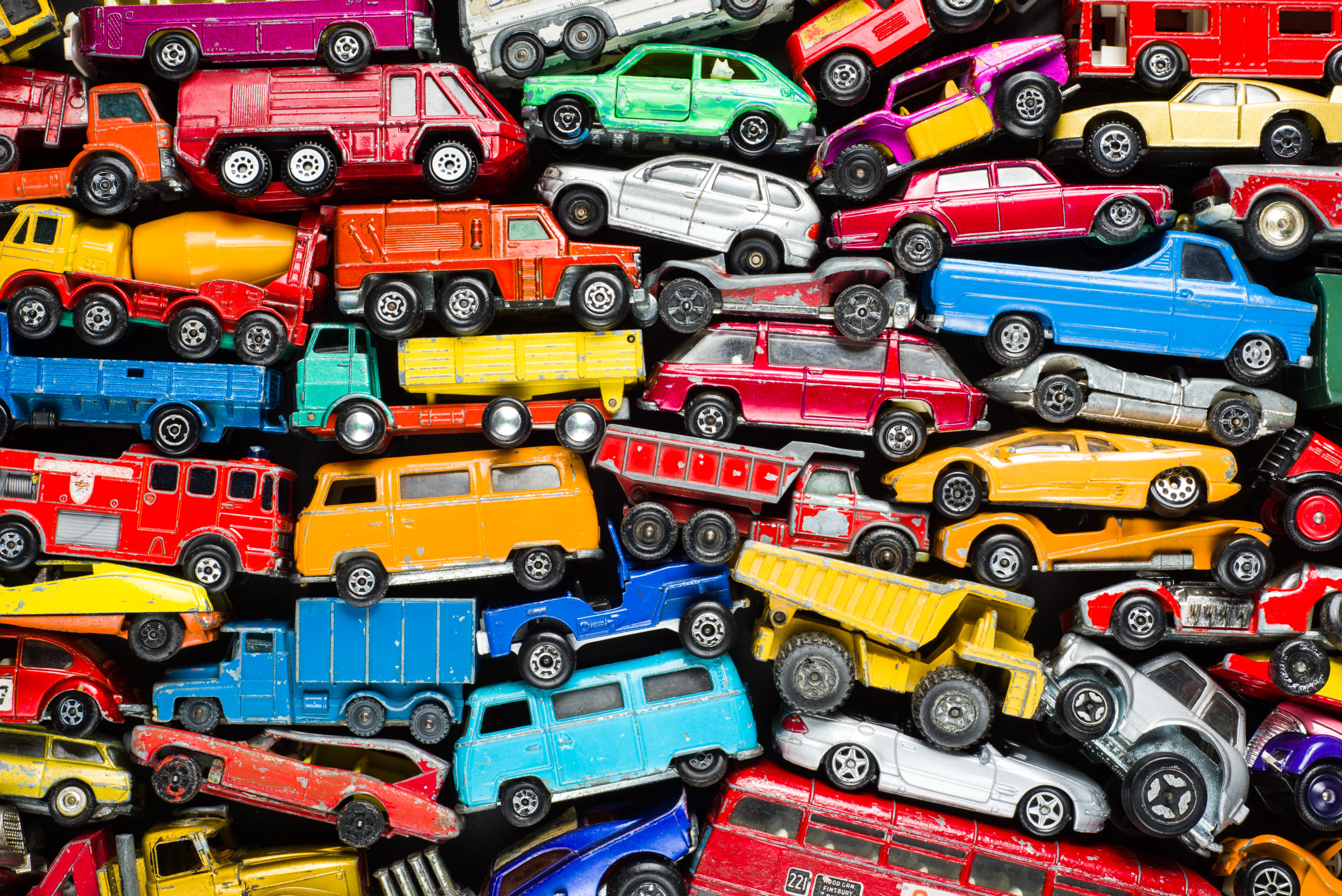 Scrap heap of vintage toy cars