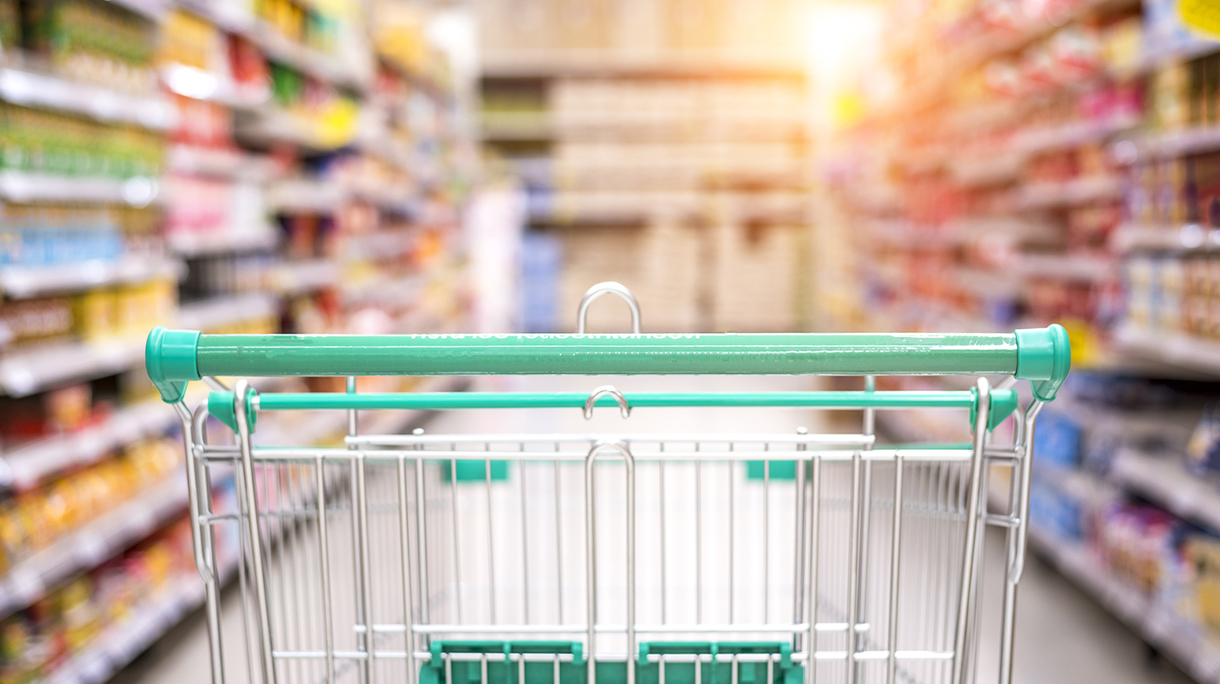 Empty shopping cart in the supermarket shopping mall