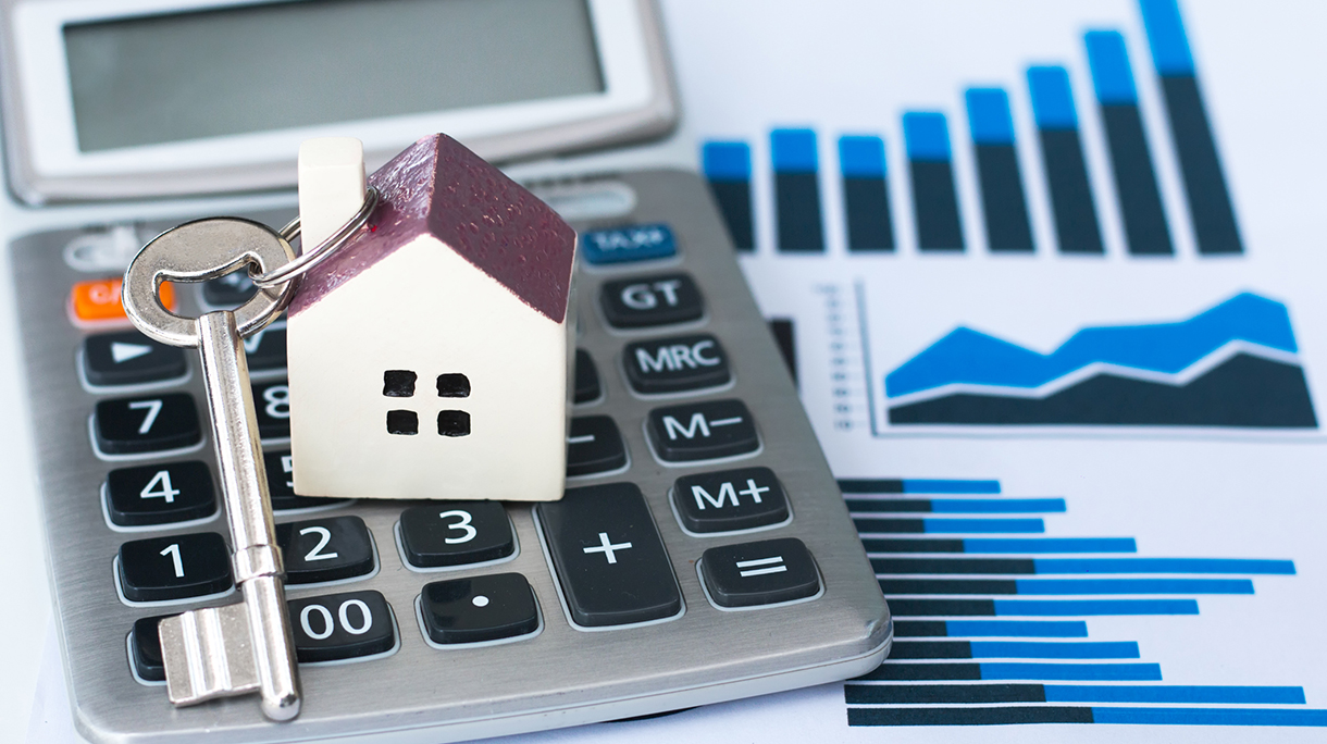 Housing market concept image with graph on chart background