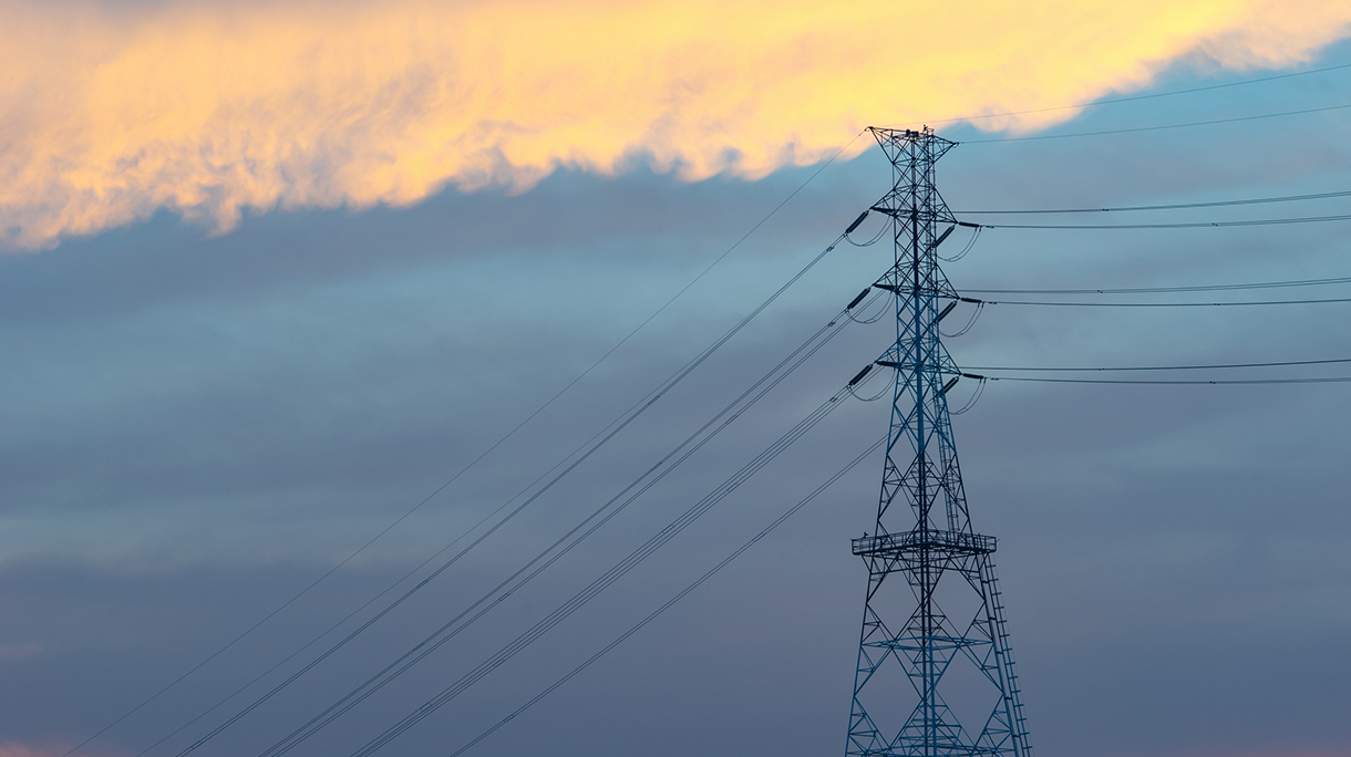 high voltage post.High-voltage tower at sky background.Power poles and various wiring