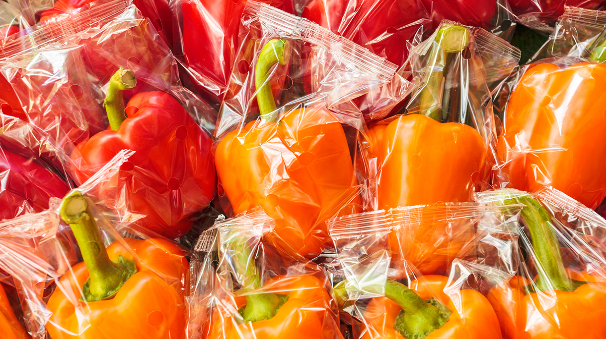 Bunch of plastic wrapped bell peppers